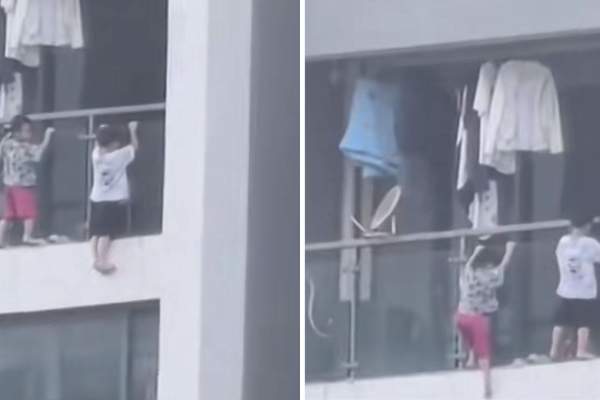Momente terifiante într-un apartament! Doi copii, filmați în timp ce au pășit în afara balconului | VIDEO