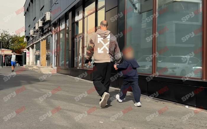 Riscă viaţa copilului! Vlad Chiricheş şi fiul, prin loc nepermis şi printre maşini! Unde se grăbeau