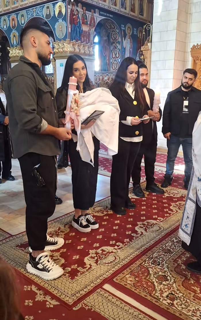Bogdan Mocanu și iubita lui, Iasmina, au fost nași de botez pentru prima dată. Imaginile emoționante în care apar cei doi | FOTO