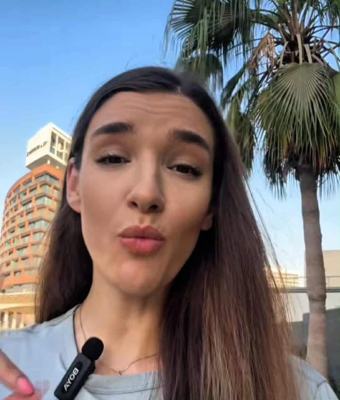 româncă în Abu Dhabi