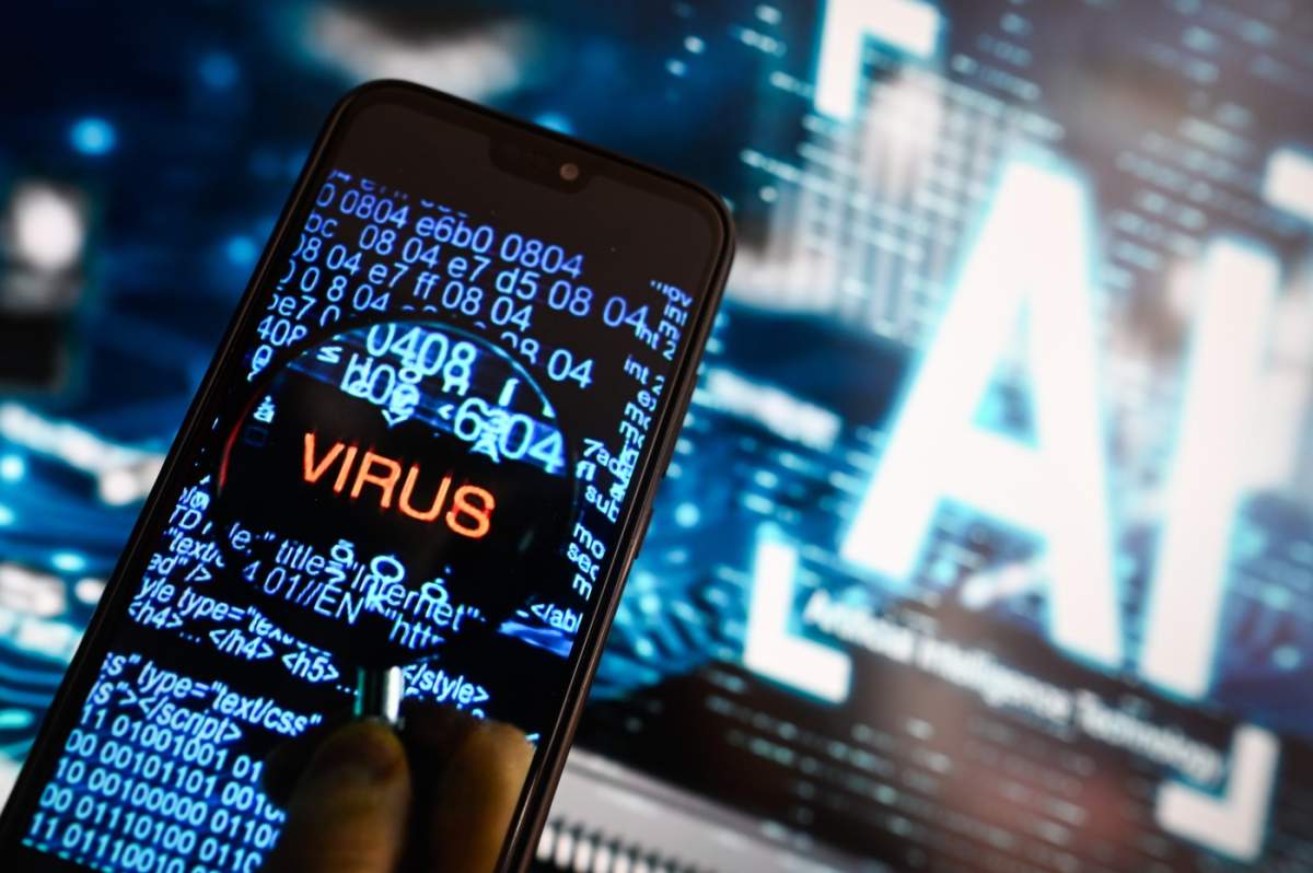 În această ilustrație foto, simbolul unui virus este afișat pe un smartphone, cu simbolul inteligenței artificiale (AI) în fundal