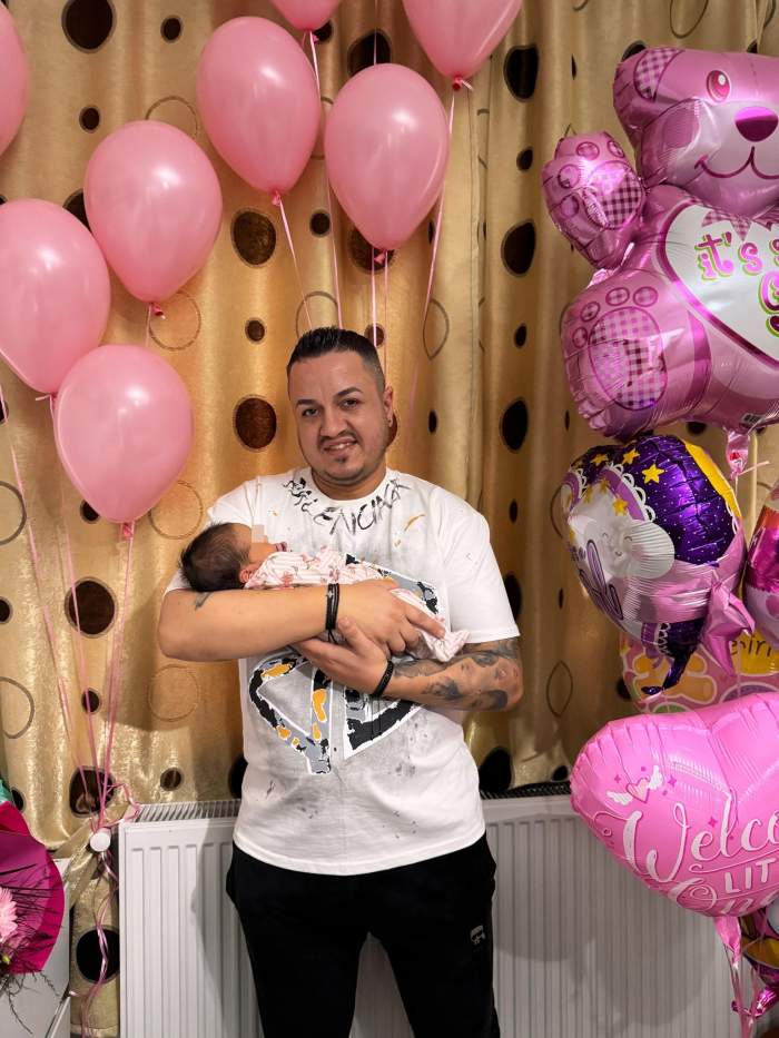 teodor si fetita lui in brate