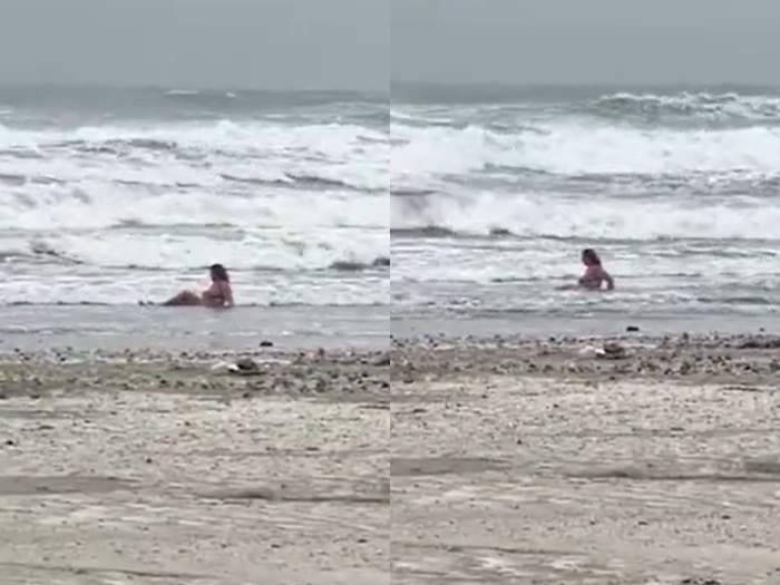 Imagini uluitoare surprinse pe o plajă din Mamaia! O femeie a făcut baie în mare deși afară erau doar 8 grade