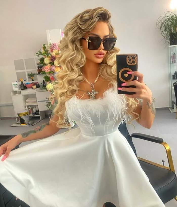 maria ilioiu intr-o rochie alba