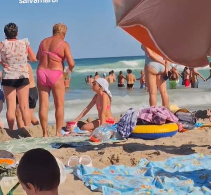 Imagini emoționante de la malul mării! Turiștii au sărit în ajutorul unui salvamar, au format un lanț uman | VIDEO