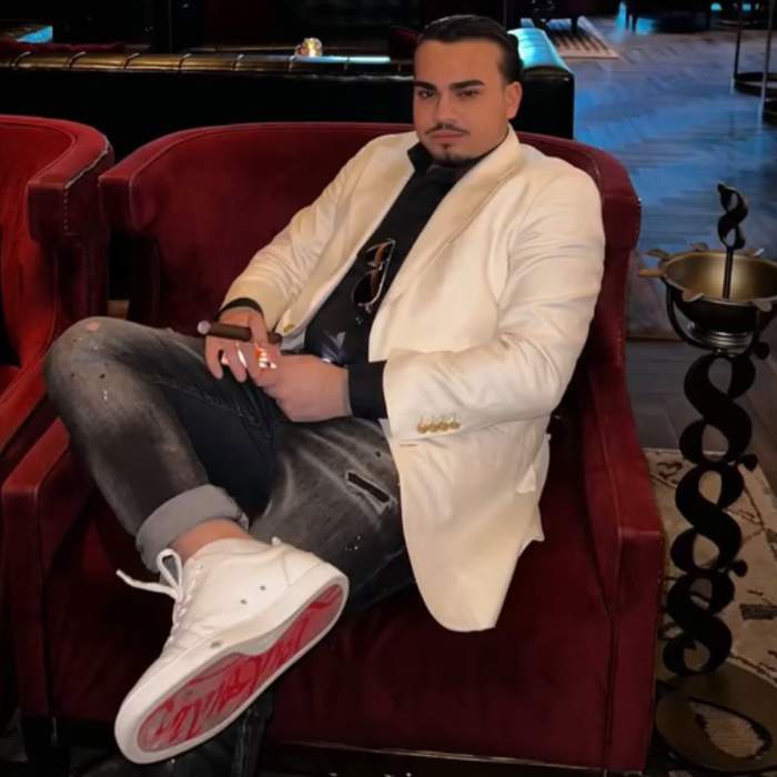 Adrian minune jr poarta sacou alb