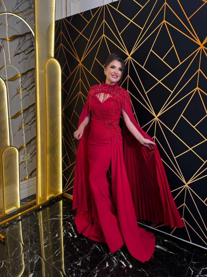 Claudia Ghitulescu poarta rochie roșie