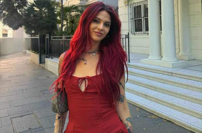 Marilu Dobrescu, într-o rochie roșie