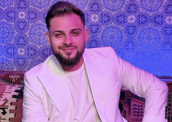 Robert Lele, îmbrăcat la costum