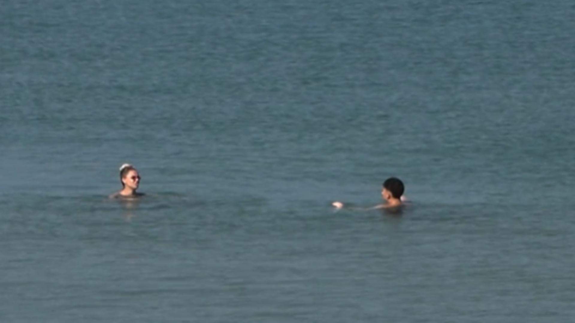 Daniela Pană și Remi Dobre în apă