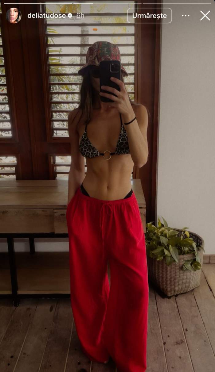 Iubita lui Adi Vasile, cu abdomenul la vedere