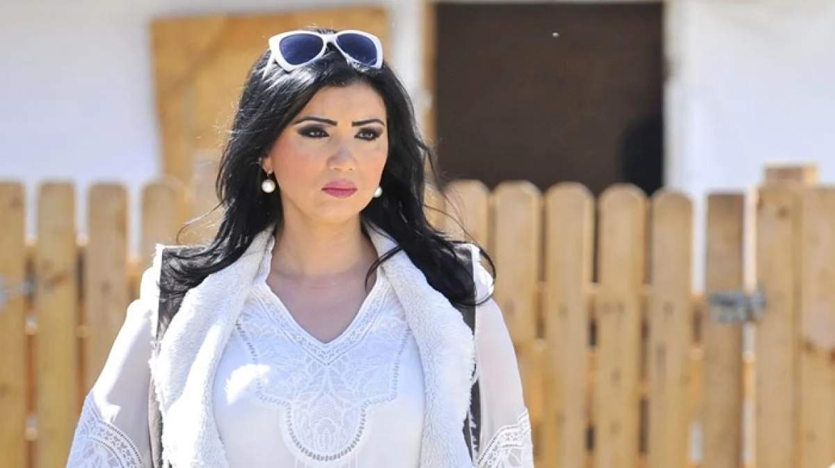 Adriana Bahmuțeanu, într-o rochie albă