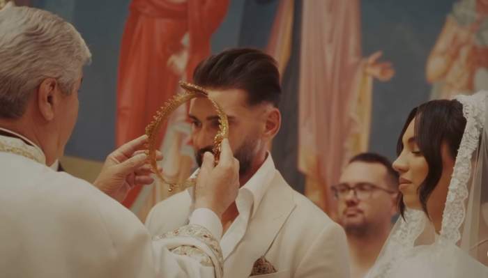 Dorian Popa și soția, la biserică