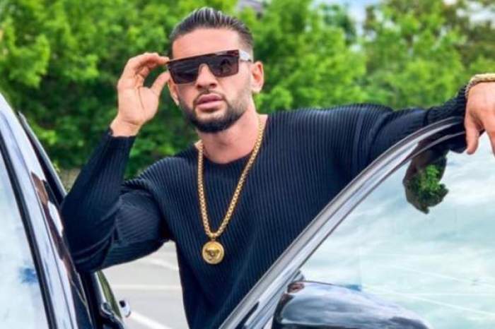 Dorian Popa lângă mașină