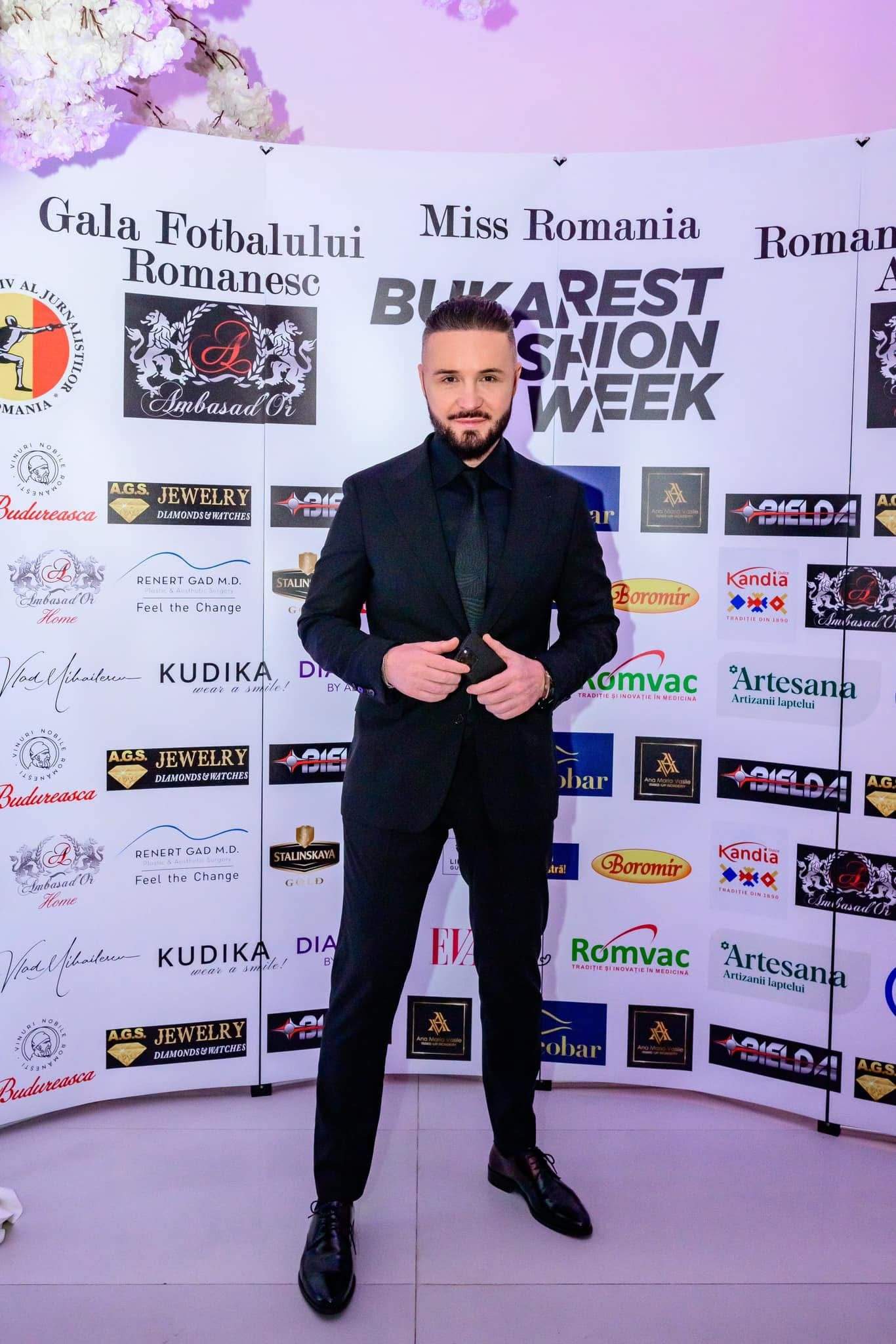 Nicusor Stan poarta un costum negru