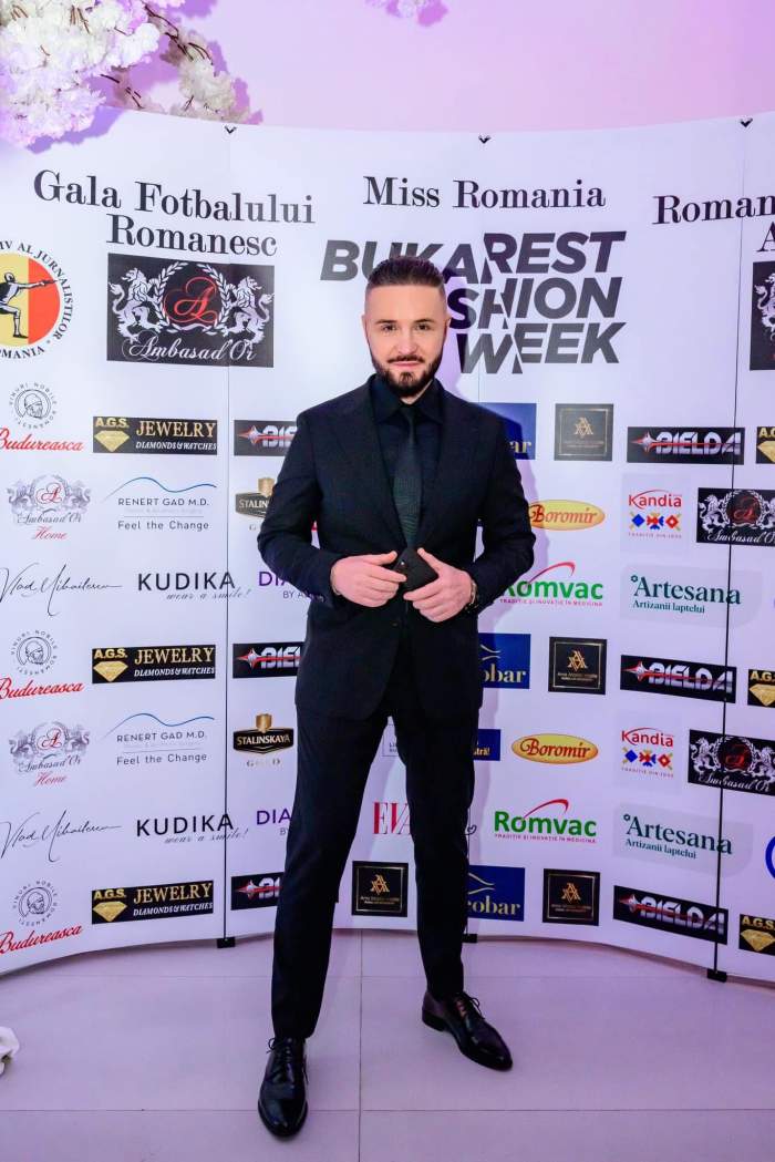 Nicusor Stan poarta un costum negru