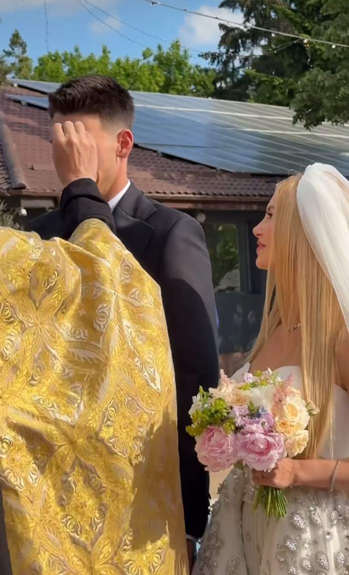 Andreea Bălan și Victor Cornea, binecuvântați de preot