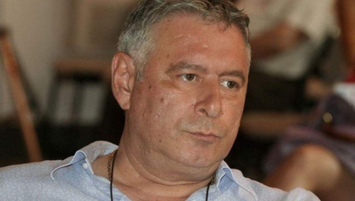 Madalin Voicu poarta camasa de culoare alba
