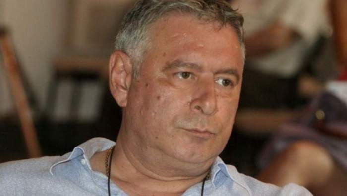 Madalin Voicu poarta camasa de culoare alba