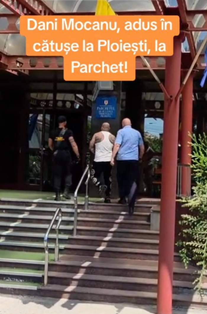 Primele imagini cu Dani Mocanu încătușat, la Parchetul din Ploiești. A fost audiat, după ce s-a filmat cu specii de animale protejate
