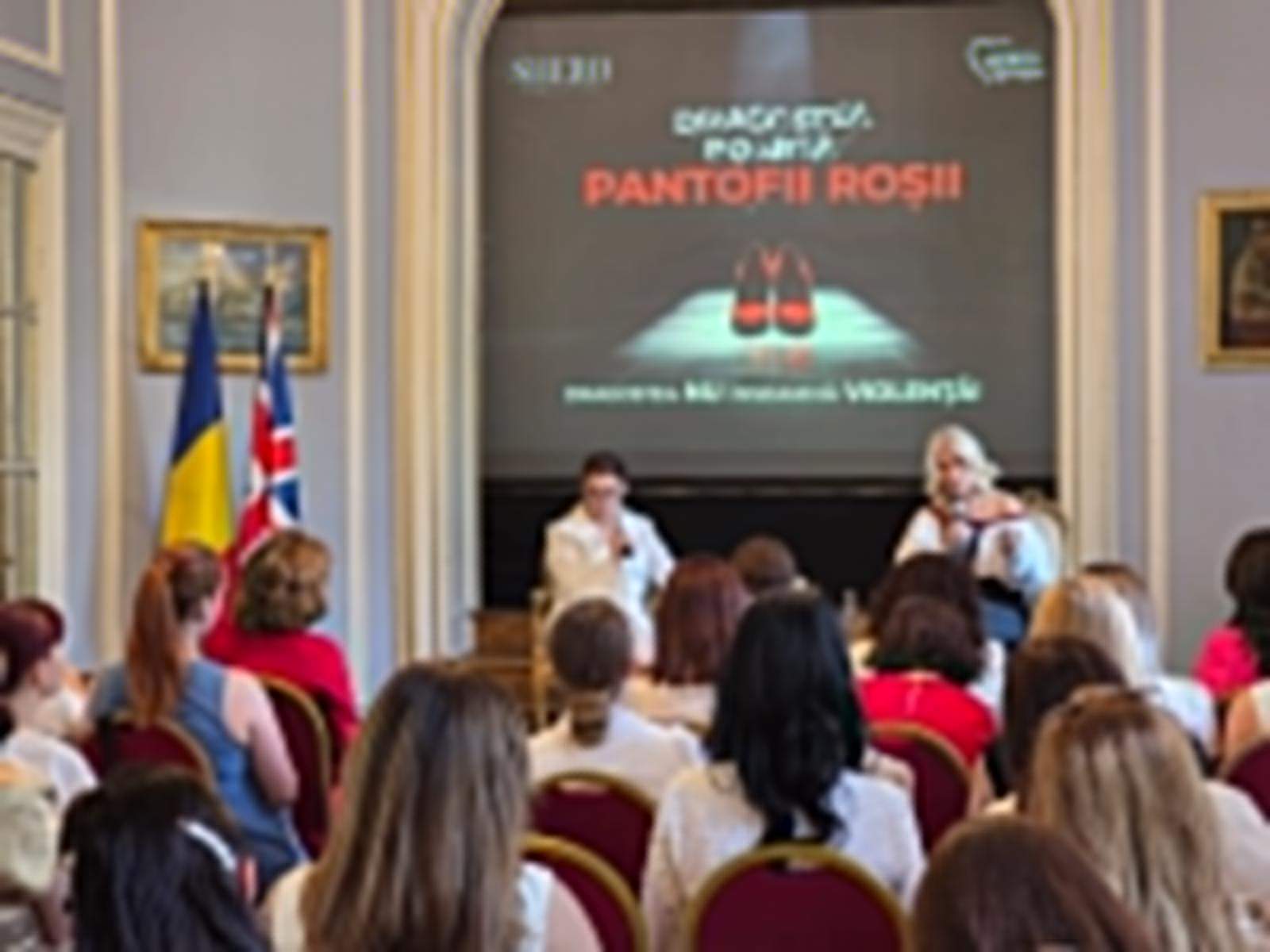 Dagostea poartă pantofii roșii. SHERO a ajuns la Londra