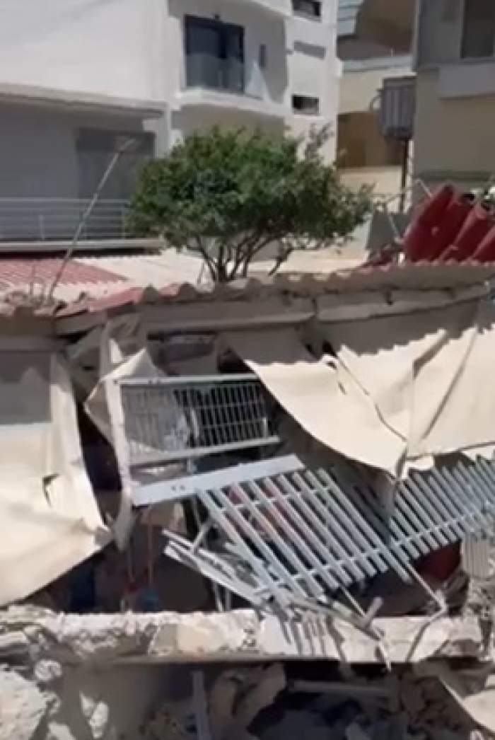 Clipe de groază în Atena. Un bloc de locuințe s-a prăbușit în centrul orașului. Zeci de pompieri intervin la fața locului