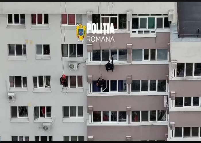 Cine este femeia din cauza căreia mascații au coborât în rapel, pe un bloc din București. Ce meserie are
