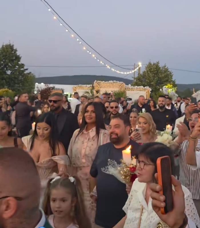 Lambada și Tzancă Uraganu, împreună la celebra nuntă cu peste 60 de perechi de nași! Ce ținută a purtat blondina