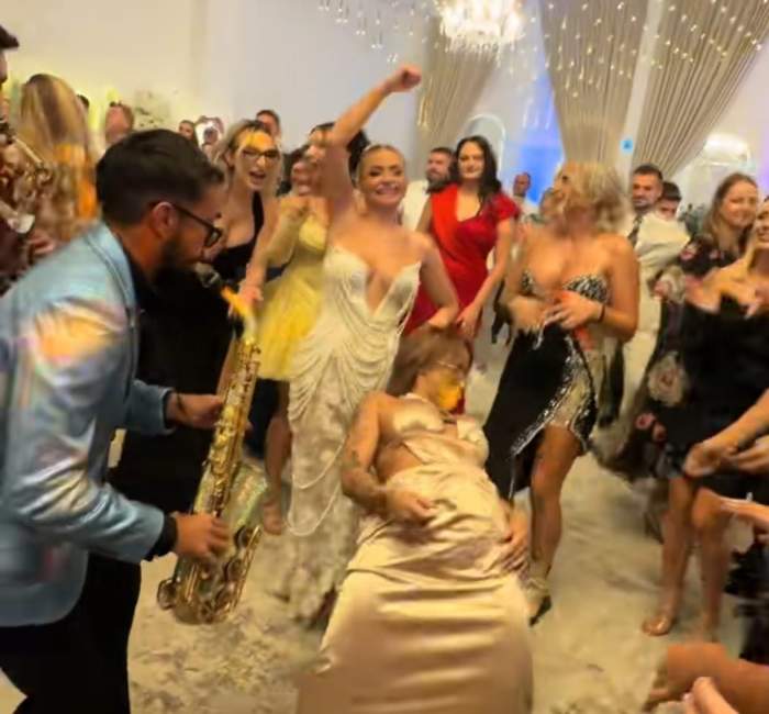 Armin Nicoară i-a băgat bani la decolteu unei dansatoare, sub privirile Claudiei Puican. Cum a reacționat domnișoara: ”Mă simt onorată”
