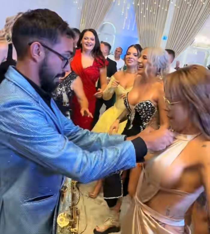 Armin Nicoară i-a băgat bani la decolteu unei dansatoare, sub privirile Claudiei Puican. Cum a reacționat domnișoara: ”Mă simt onorată”